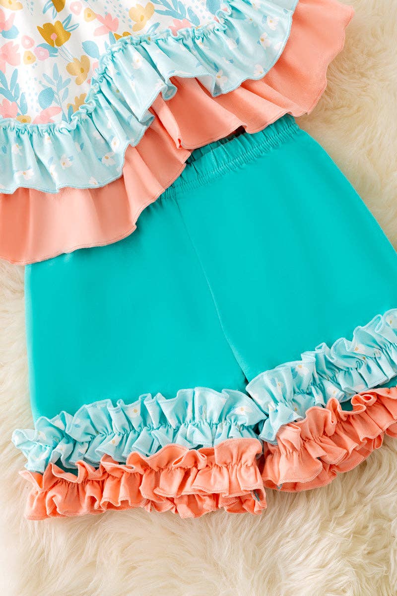 Peach & mint floral ruffle tunic & ruffle shorts.