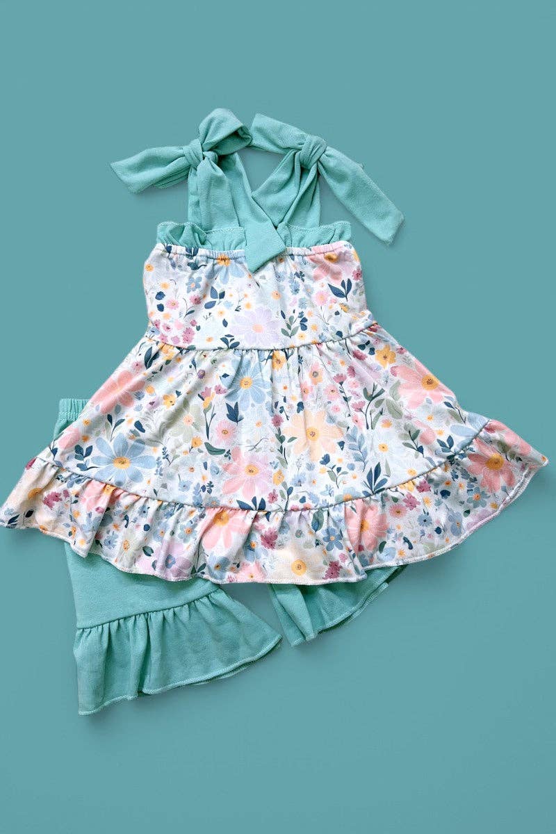 Floral printed ruffle tunic & teal shorts.