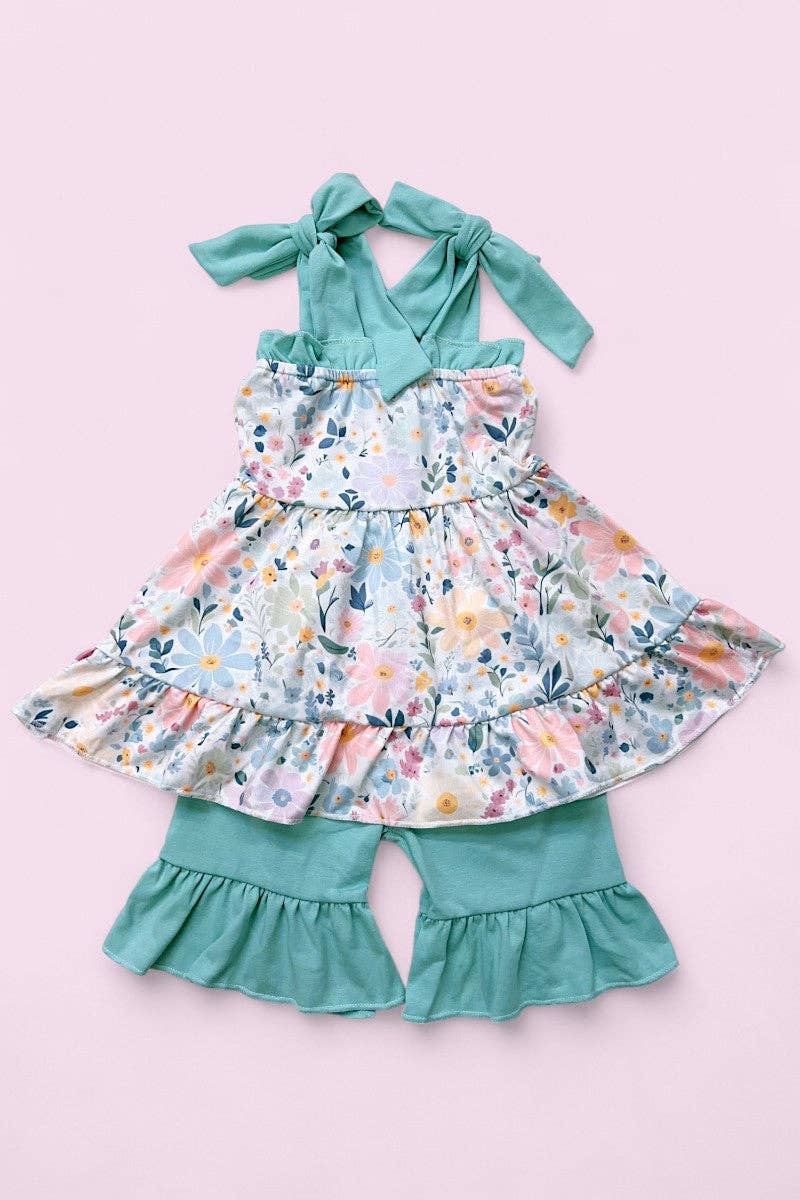Floral printed ruffle tunic & teal shorts.
