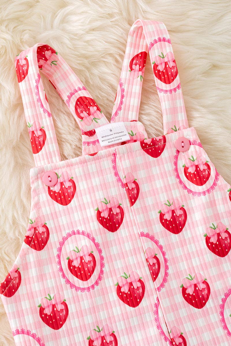 Strawberry printed girls romper with front pockets.