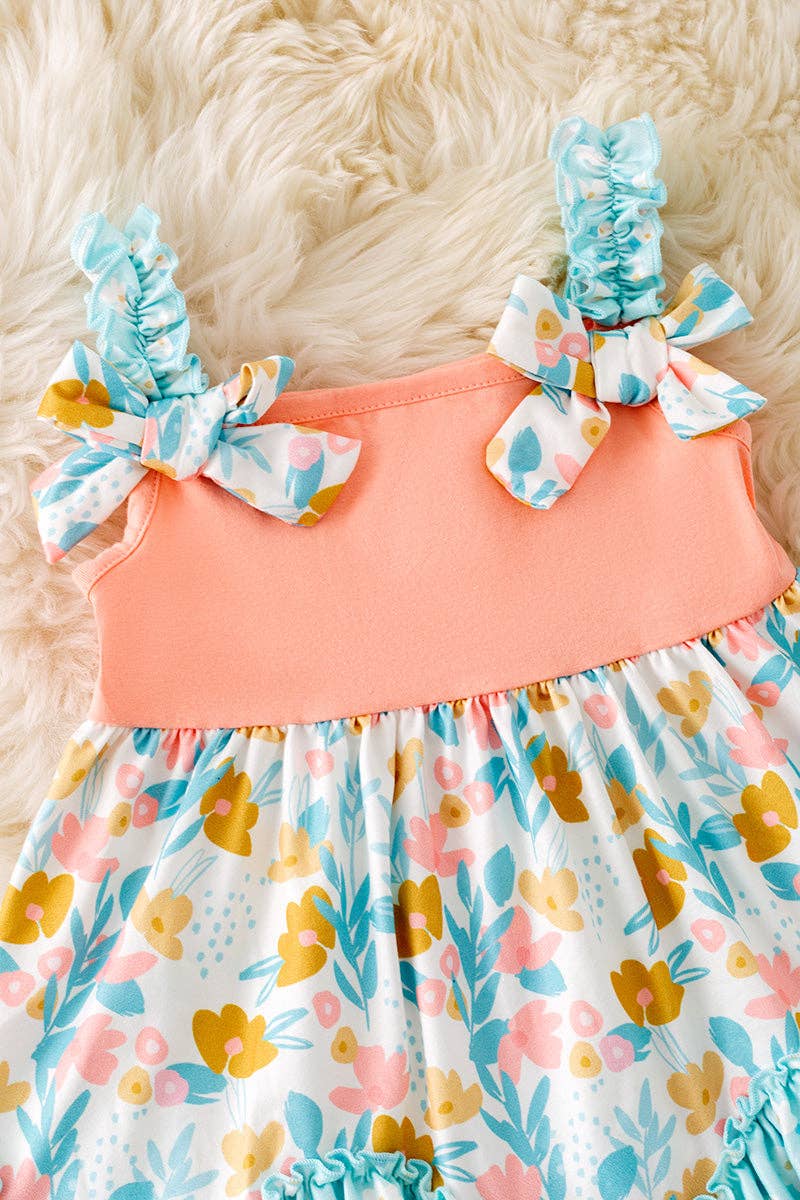 Peach & mint floral ruffle tunic & ruffle shorts.