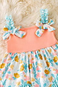 Peach & mint floral ruffle tunic & ruffle shorts.