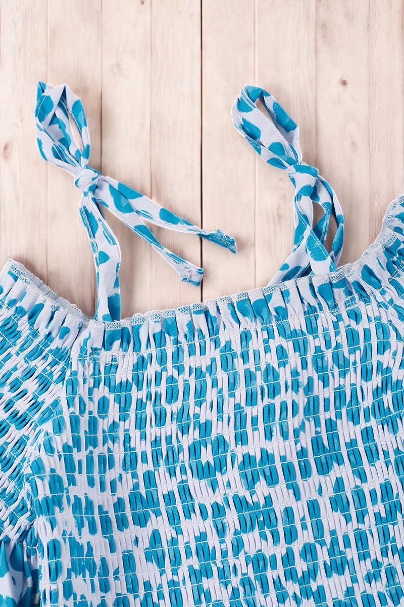 Animal printed cold shoulder top & relaxed fit shorts.
