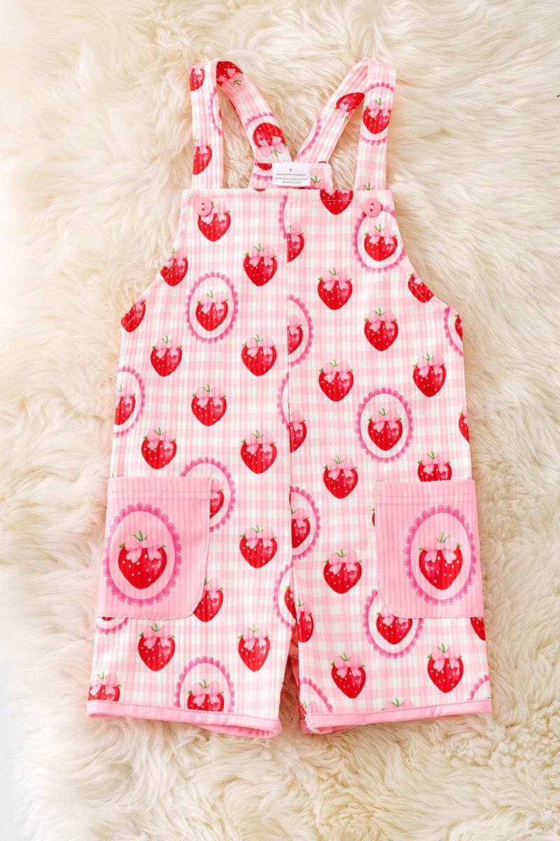 Strawberry printed girls romper with front pockets.